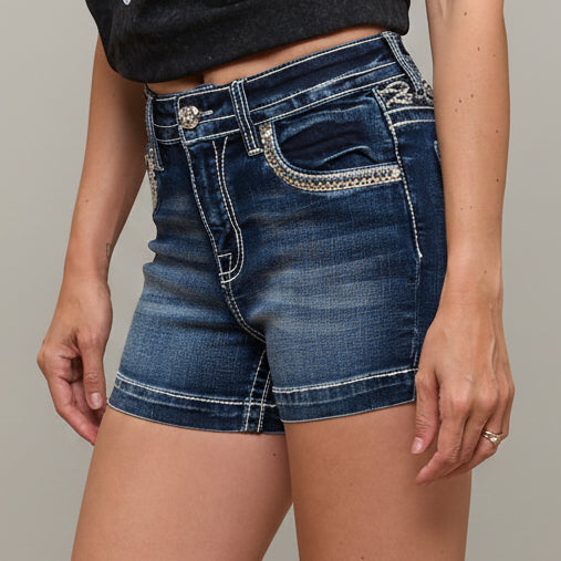 High-waist dark wash denim shorts with embroidered front pocket flap detail
