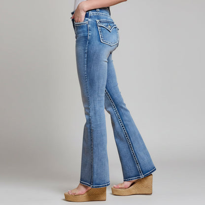 Women’s blue denim bootcut jeans with high waist, stitched pockets, and curved seams