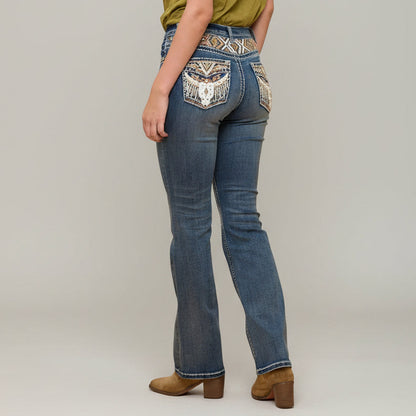 Blue bootcut jeans with embroidered back yoke pocket and stitched back seams.