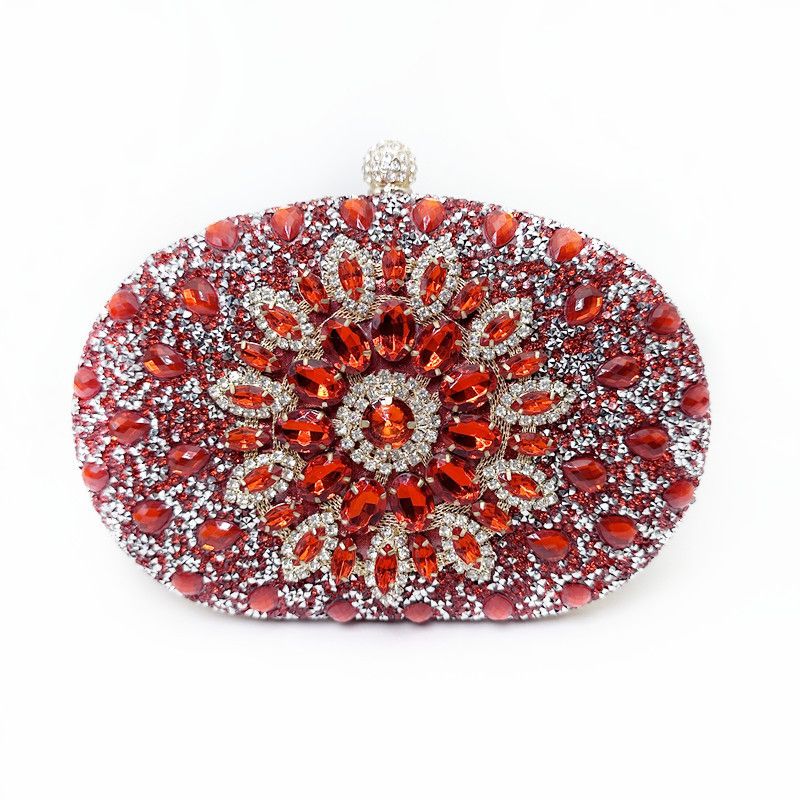 Red rhinestone oval evening clutch with orange center flower clasp
