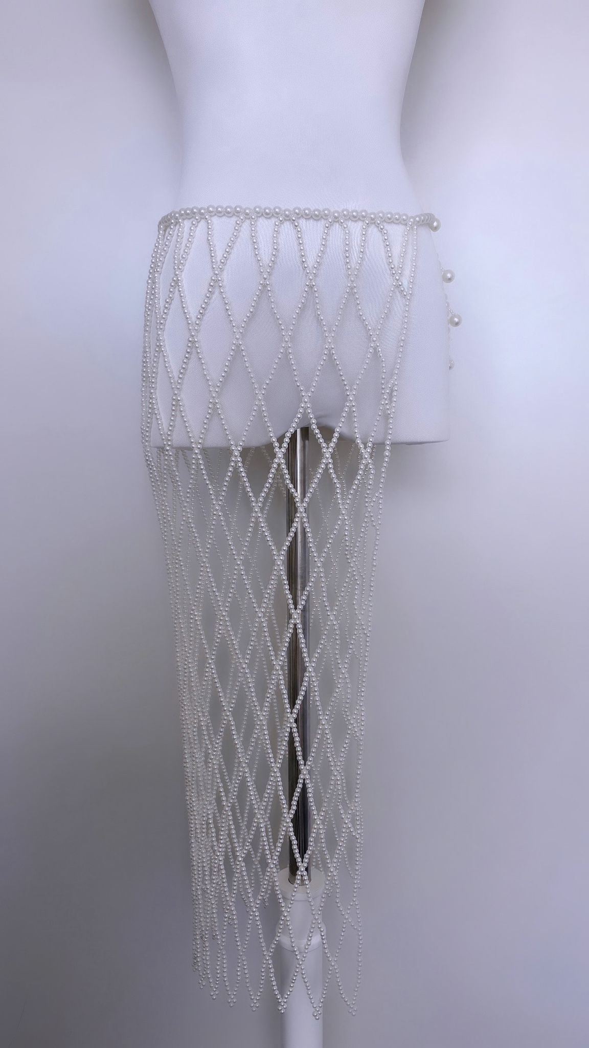 Midi pearl mesh skirt with adjustable waist ties and diamond lattice drape