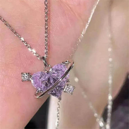 Sterling-silver tone necklace with purple heart and diamond-like stone pendant