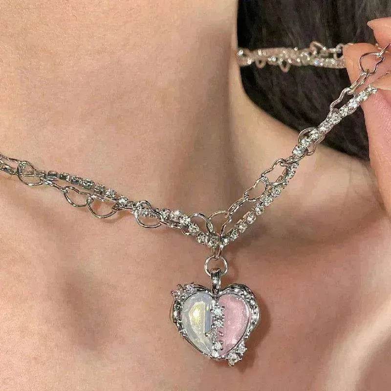 Silver-tone choker-style necklace with pink and clear heart pendant