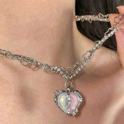 Silver-tone choker-style necklace with pink and clear heart pendant