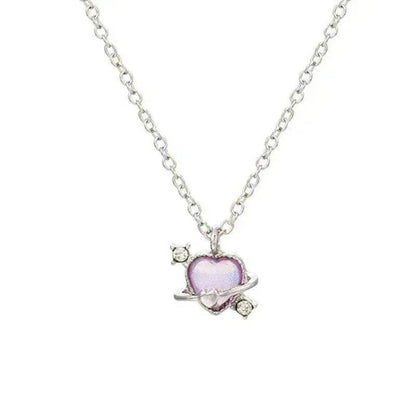 Silver-tone necklace with small pink heart pendant and tiny crystal accents