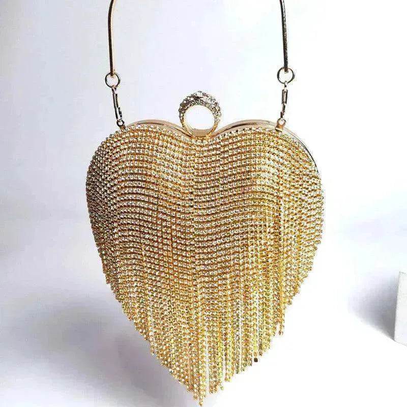 Gold heart-shaped rhinestone chain tassel handbag with top handle and clasp ring