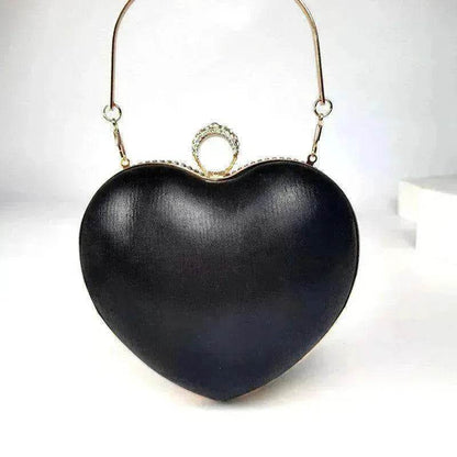Black heart-shaped satin handbag with metal ring clasp and loop top handles