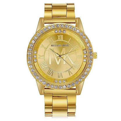 Gold metal band wristwatch with rhinestone bezel and Roman numeral dial