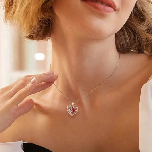 Heart pendant necklace with red crystal center, clear rhinestone halo, chain