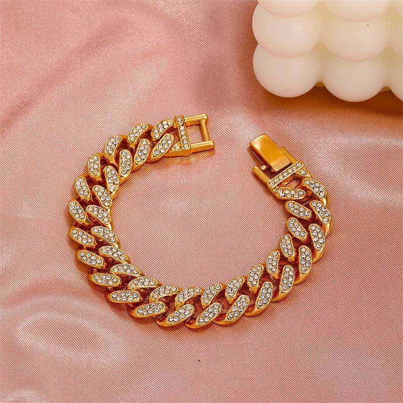 Gold cuban chain bracelet with diamond-look oval links and gold clasp