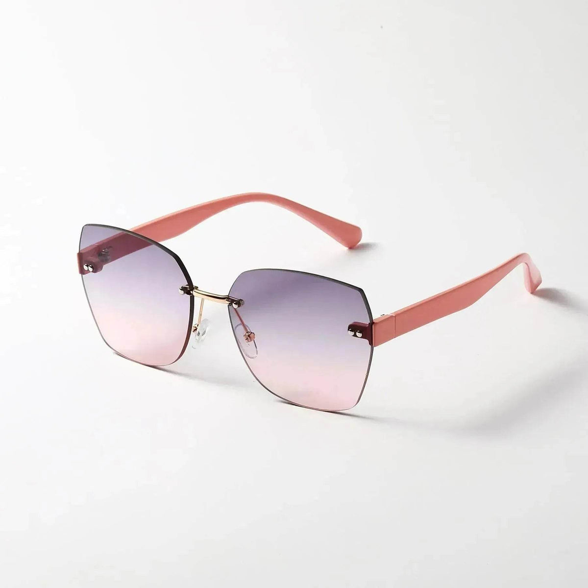 Women's sunglasses with coral-pink frame and purple tinted lenses