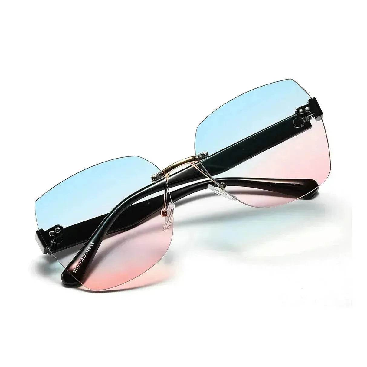 Women's sunglasses with black frame and blue-to-pink gradient lenses