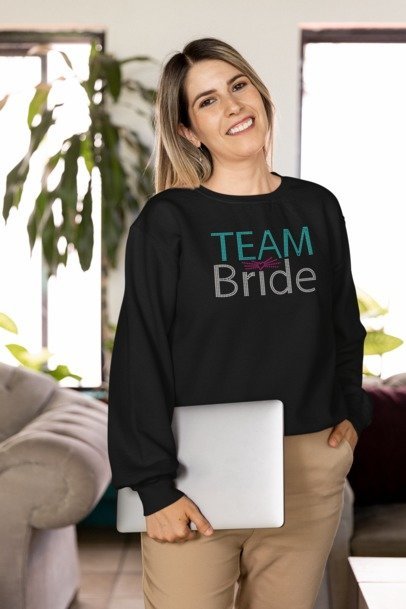 Black long-sleeve shirt with rhinestone 'TEAM Bride' lettering