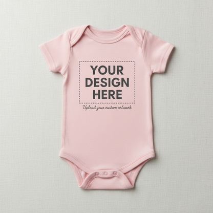 Pink short-sleeve baby onesie with 'YOUR DESIGN HERE' front print