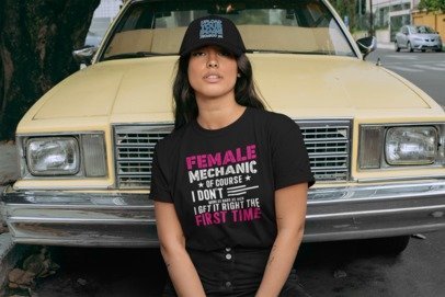 Black short-sleeve graphic tee with “Female Mechanic” pink text on the front